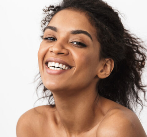black women smiling at camera