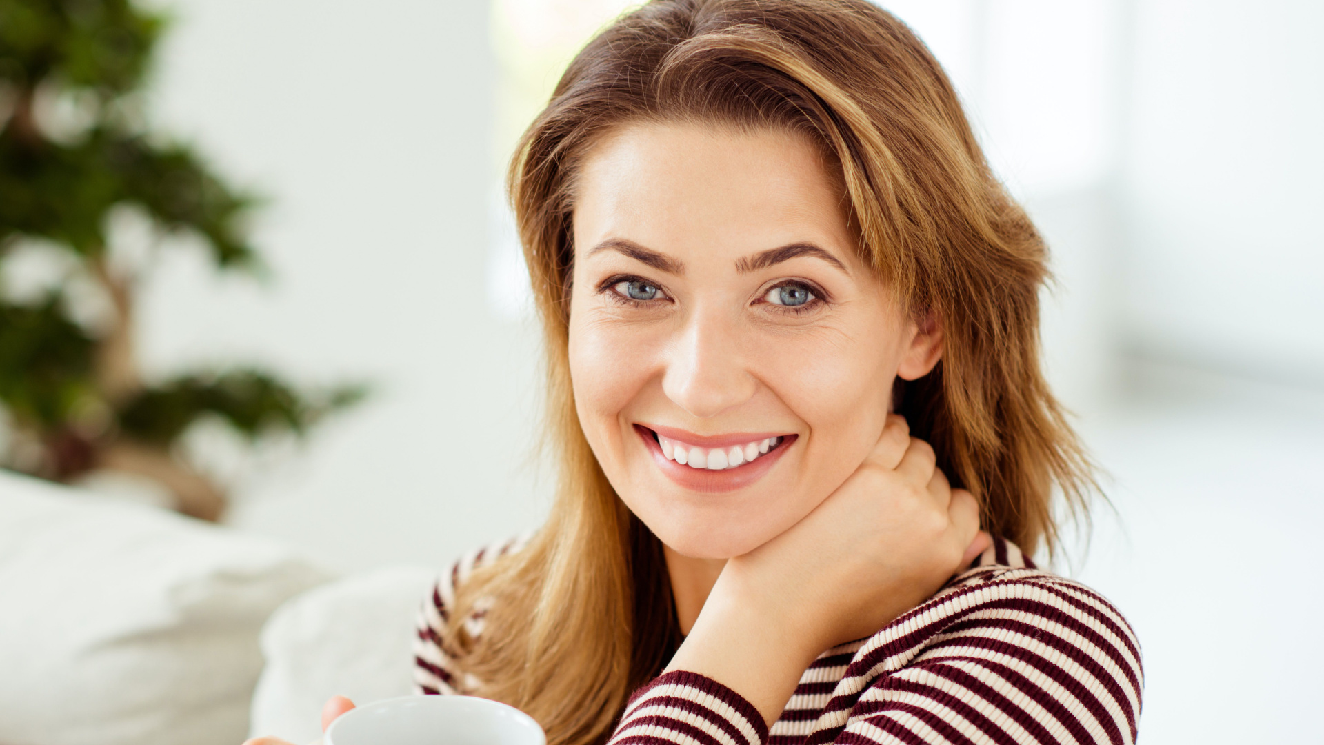woman smiling into the camera