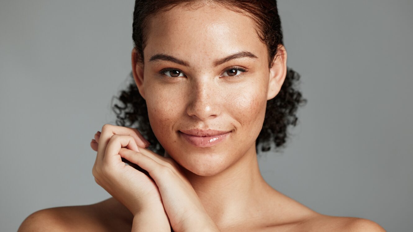 Woman with smooth, even complexion representing Halo laser treatment results for improved skin tone, texture, and natural radiance