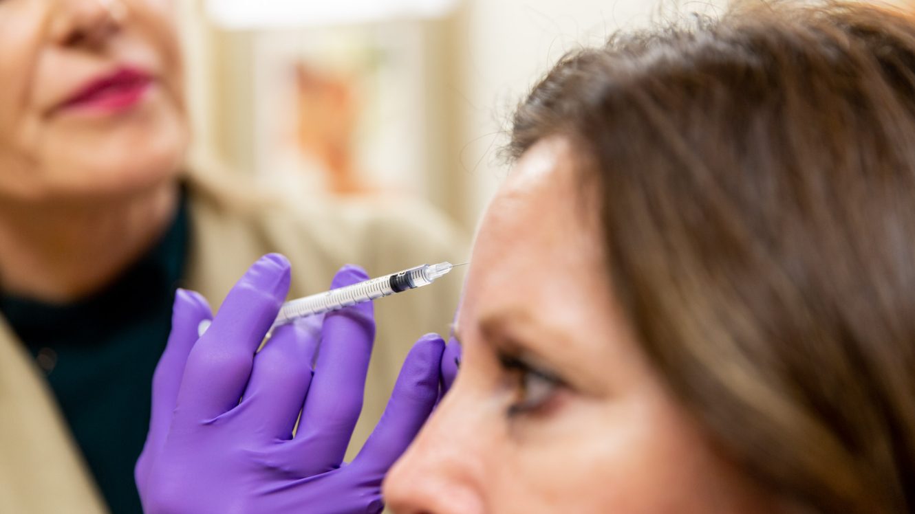woman receives injection treatment near Minneapolis