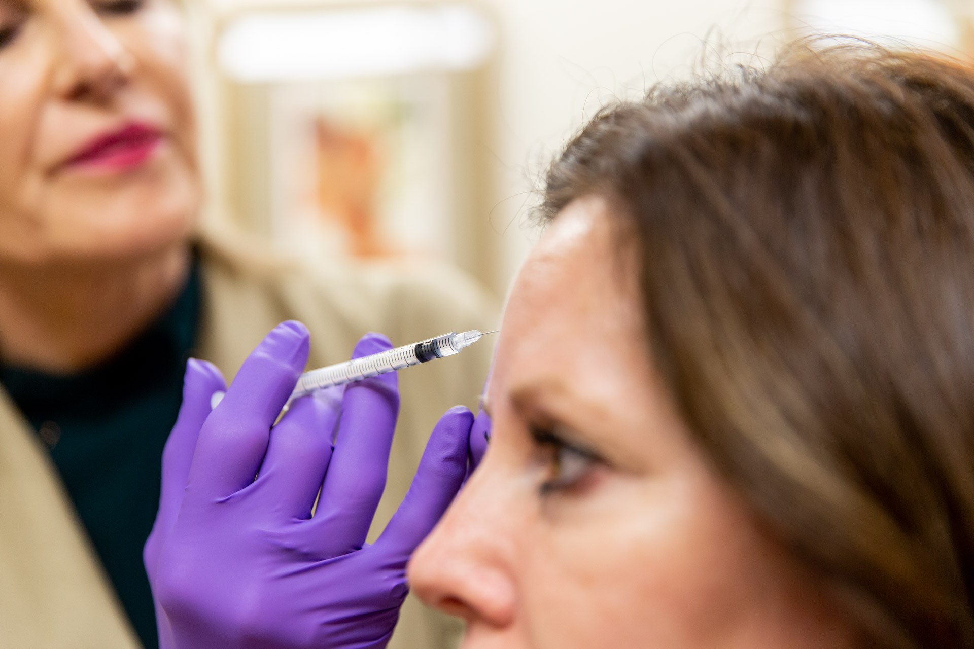 woman receives injection treatment near Minneapolis