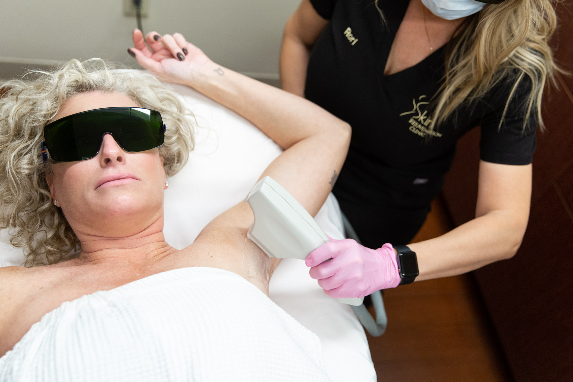 Woman receiving Laser Hair Removal Treatment in Minneapolis