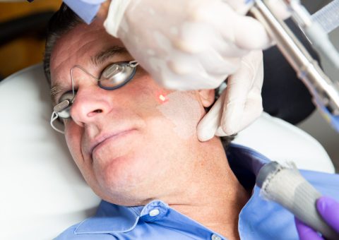 a man receives laser skin resurfacing treatment near minneapolis