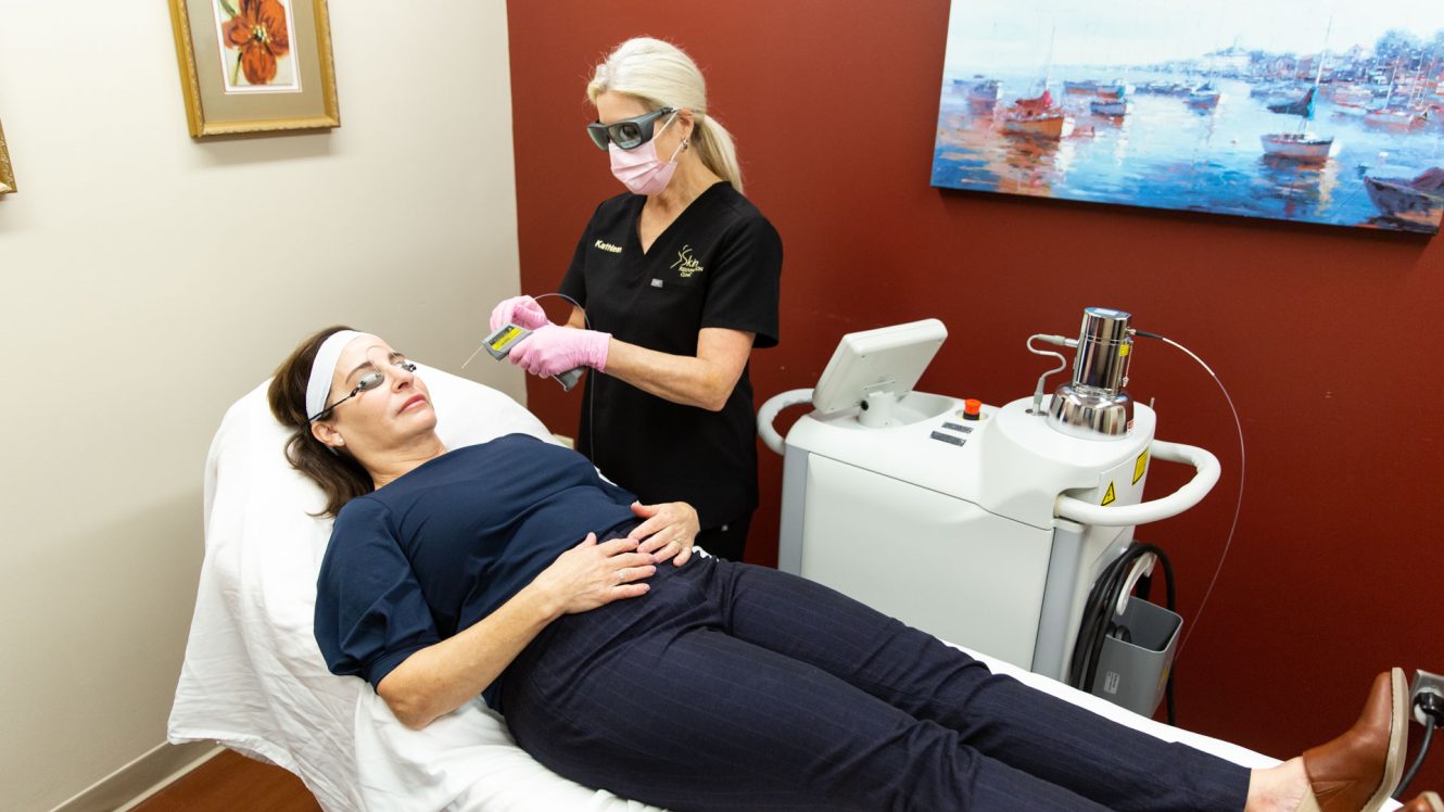 Women receiving AcneLase treatment