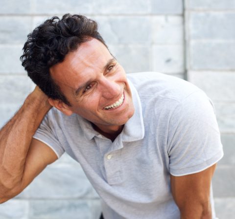 Handsome older man laughing