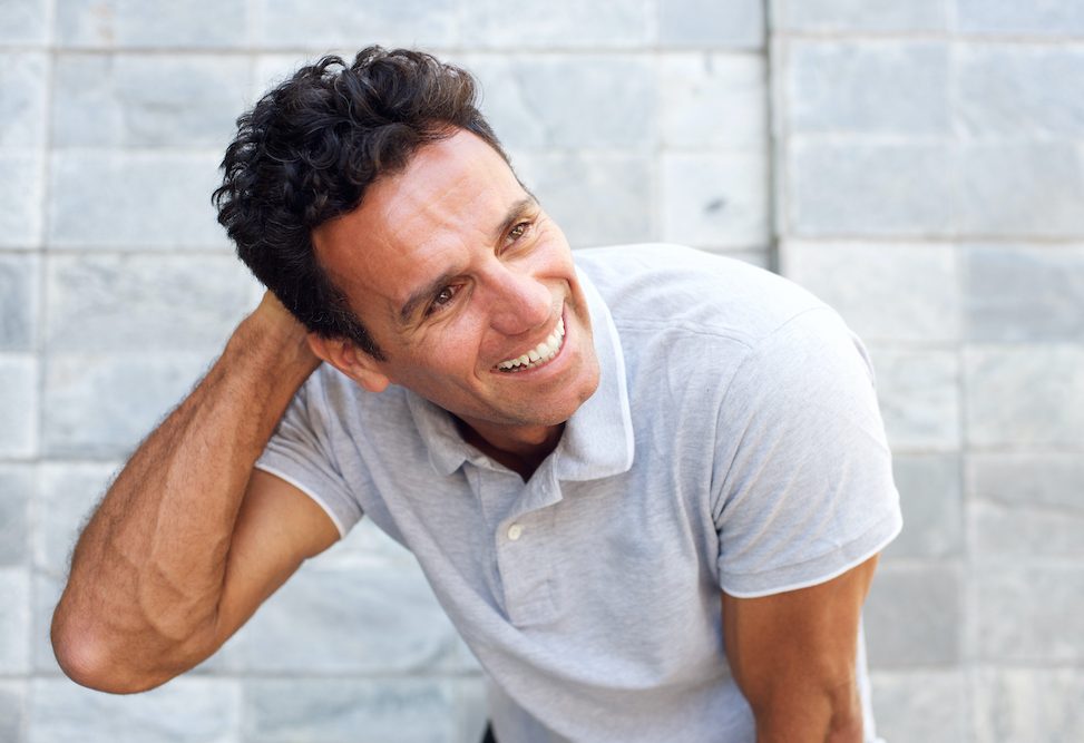 Handsome older man laughing