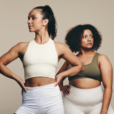 2 women looking away from each other