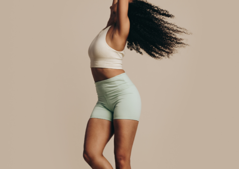 women flipping her hair around