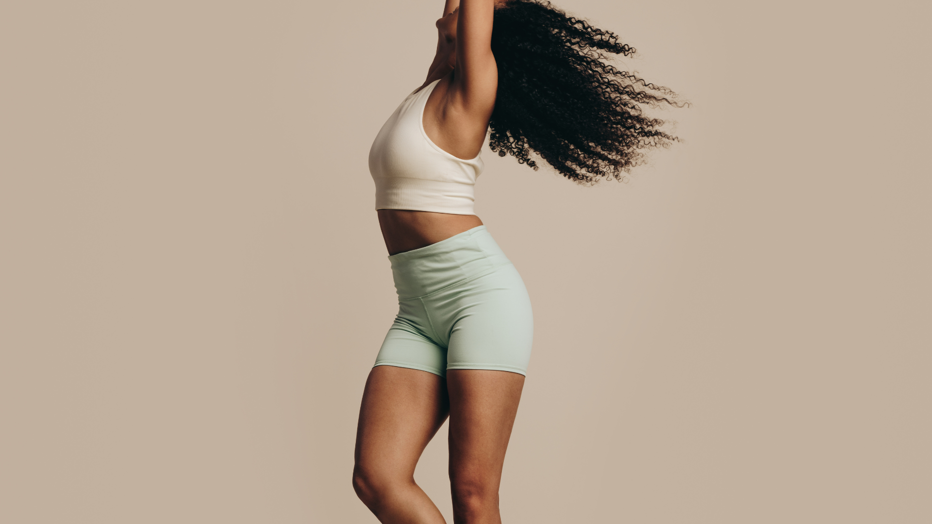 women flipping her hair around