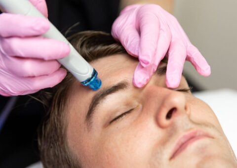 Man recieving Hydrafacial treatment